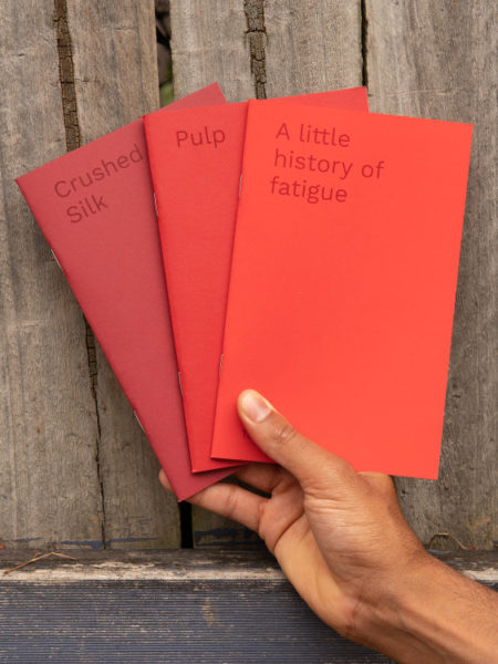 Red Series - image of three pamphlets, each a different shade of red